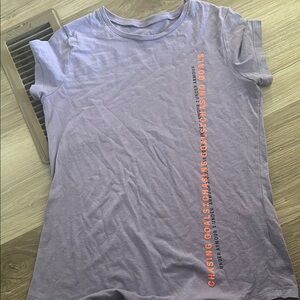 Under Armour girls Purple T-Shirt with Orange Text Sz YLG